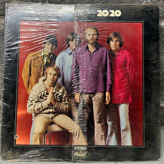 A vintage vinyl record sleeve for the band 'The Nice' and their album '20 20', wrapped in clear plastic. The cover features a group photo of the band members against a red background, with a black border.