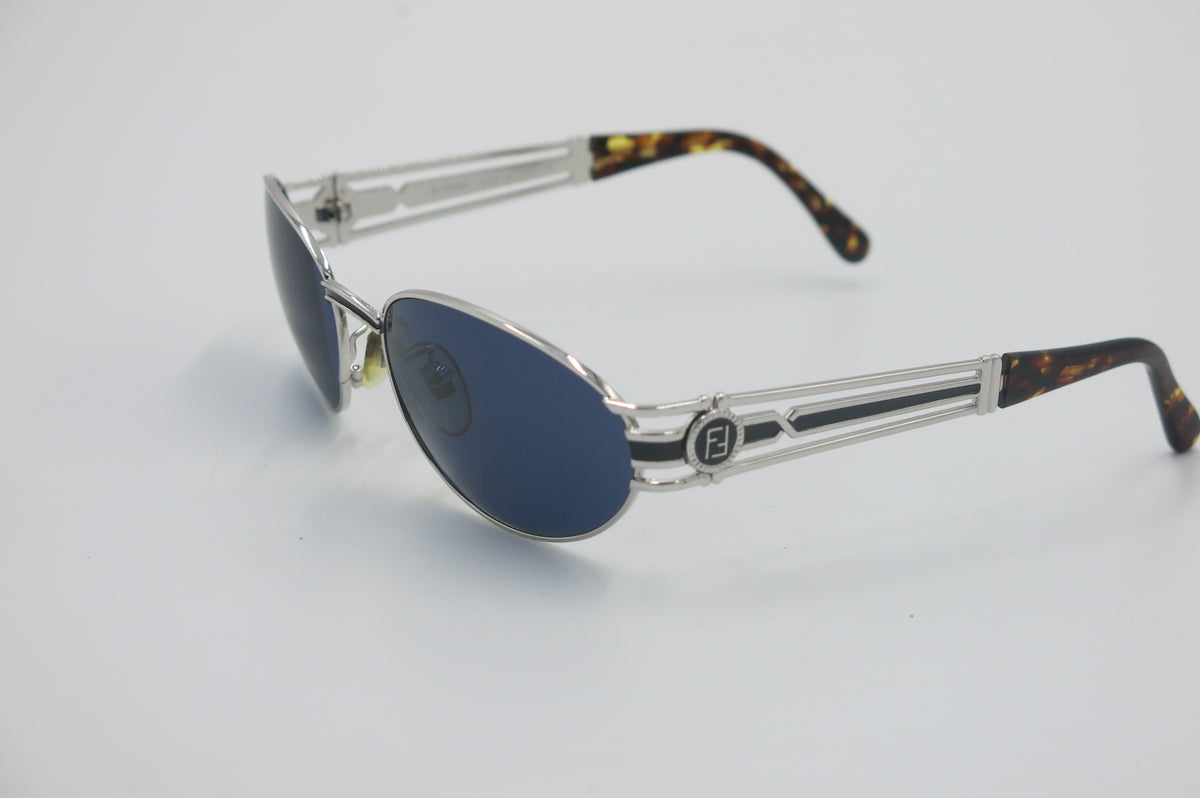 Fendi SL7030 Vintage Deadstock Oval Sunglasses – Blue Lenses & Sculptural Logo Temples