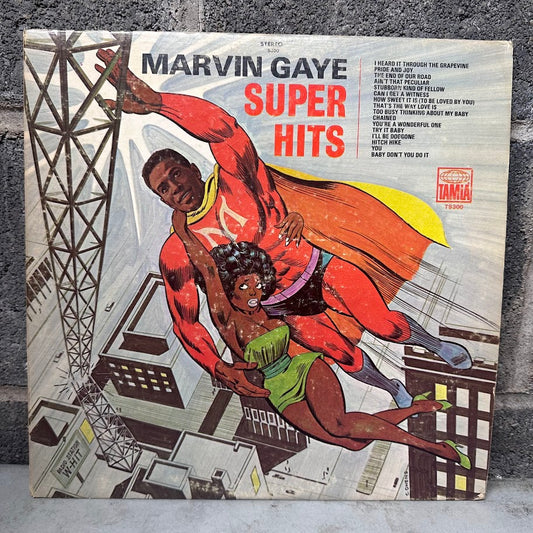 Vinyl record cover for Marvin Gaye's 'Super Hits' with superhero-themed artwork.