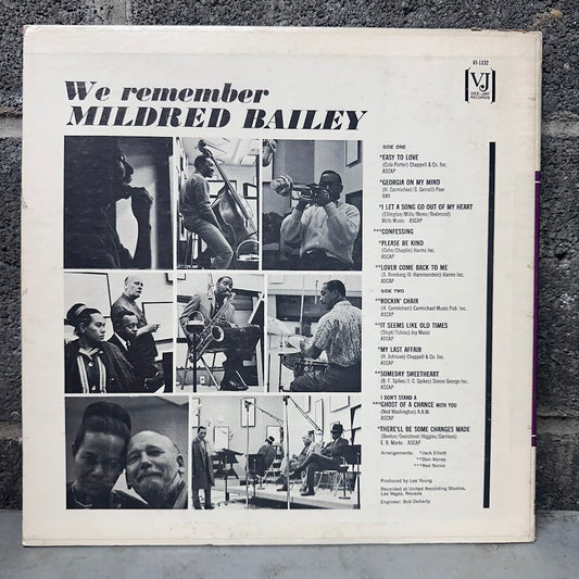 The back cover of a vinyl record sleeve for 'We remember Mildred Bailey' on a textured gray surface. The cover is off-white with black text and a grid of six black-and-white photographs depicting jazz musicians performing.