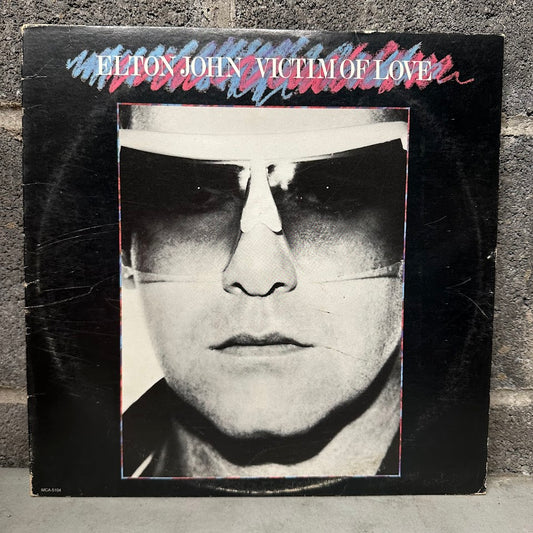 Elton John – Victim of Love