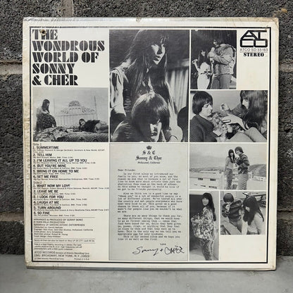 Album cover for 'The Wondrous World of Sonny & Cher' with black and white photos and text.
